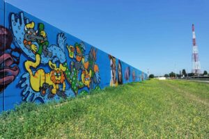 Waterkeringsmuur met graffiti aan Scheldelaan